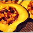 Acorn squash stuffed with apples, cranberries and walnuts